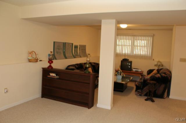 154 Ash Lane Kunkletown, PA 18058 - Photo 15 of 20 a bedroom with a bed and a couch