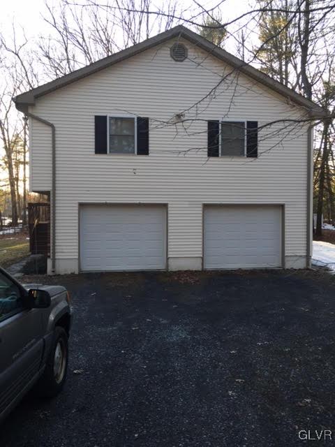 154 Ash Lane Kunkletown, PA 18058 - Photo 17 of 20 a front view of a house with a yard