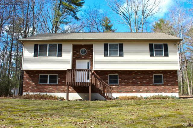 154 Ash Lane Kunkletown, PA 18058 - Photo 20 of 20 a front view of a house with a yard