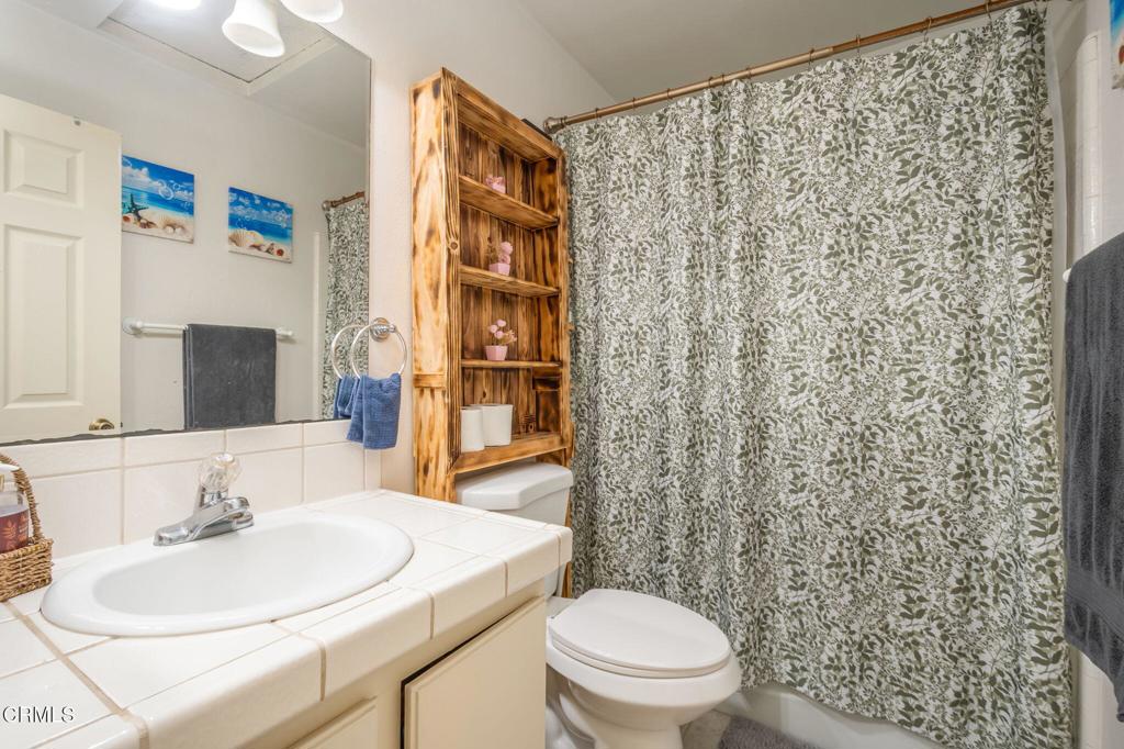 3610 Isle Way Oxnard, CA 93035 - Photo 18 of 25 a bathroom with a sink toilet and shower