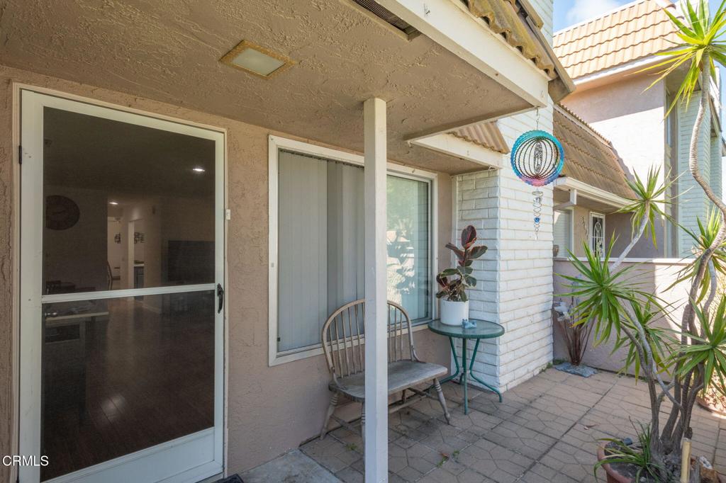3610 Isle Way Oxnard, CA 93035 - Photo 3 of 25 a front view of a house with outdoor seating and shower
