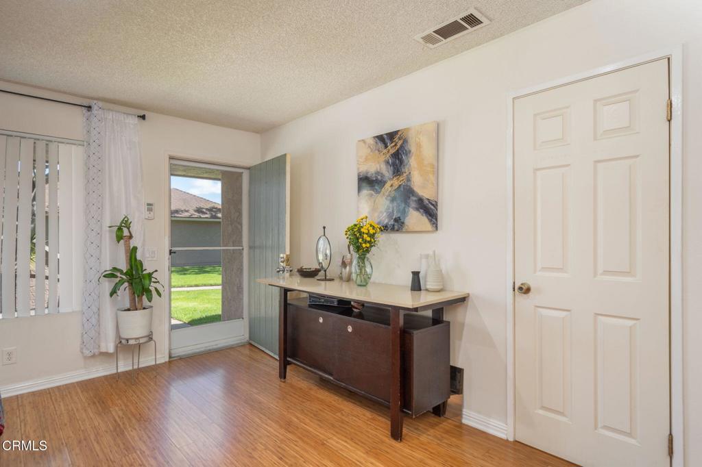 3610 Isle Way Oxnard, CA 93035 - Photo 4 of 25 a view of an entryway with wooden floor