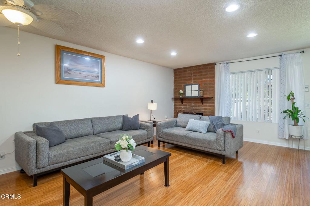 3610 Isle Way Oxnard, CA 93035 - Photo 7 of 25 a living room with furniture and wooden floor