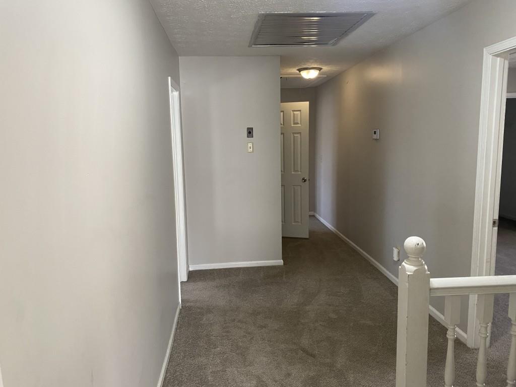 1720 Ridgefield Drive Roswell, GA 30075 - Photo 18 of 35 a view of a livingroom with a bathroom