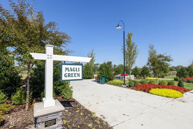a view of a street with sitting area