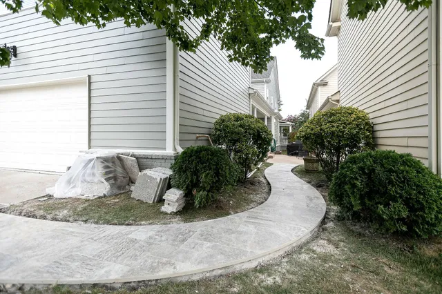 a view of a potted plants in front of a house