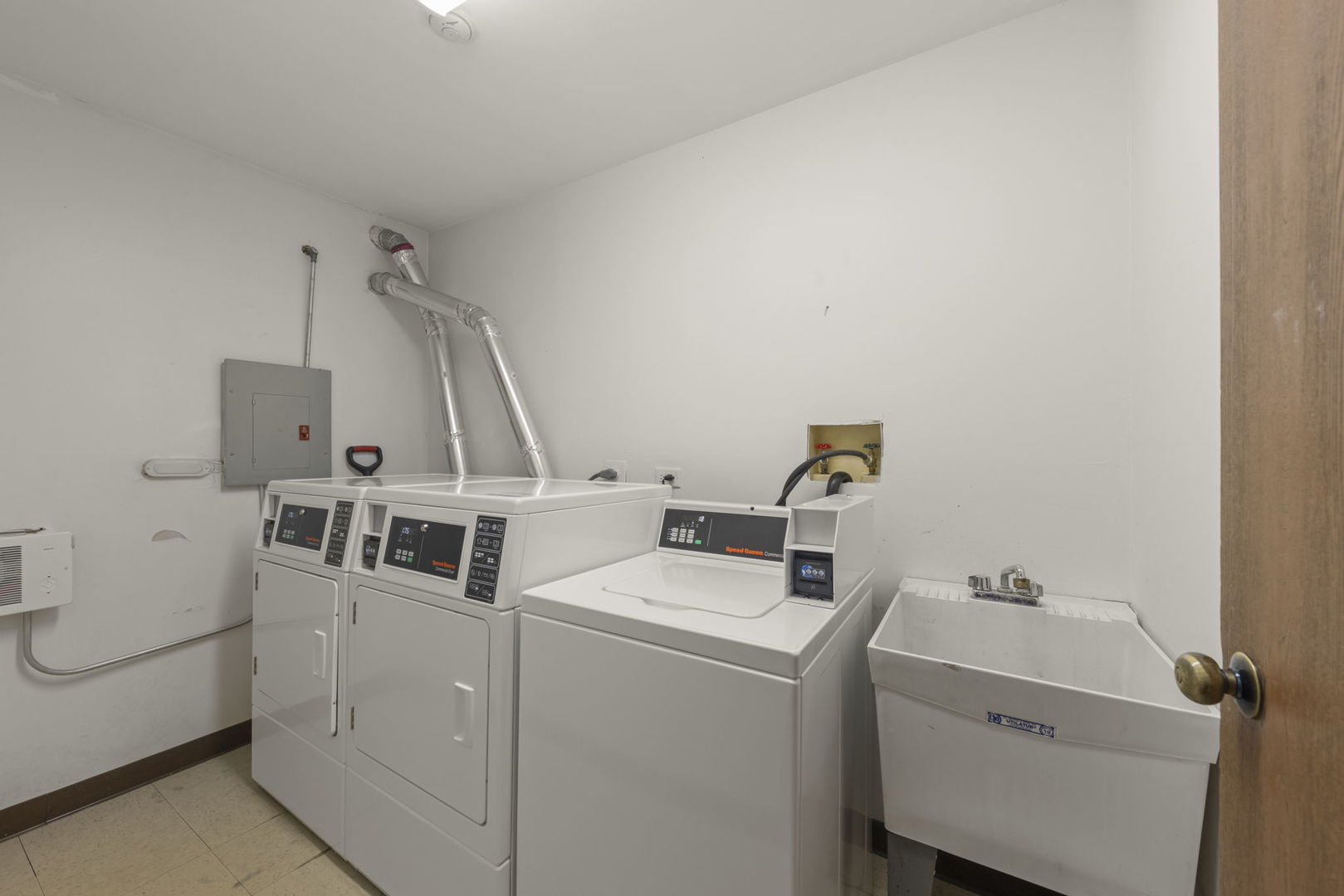 1002 Spruce Street, Unit 2B Glendale Heights, IL 60139 - Photo 12 of 16 a utility room with dryer and washer