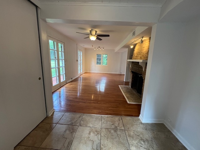 14935 West Old School Road, Unit 2 Libertyville, IL 60048 - Photo 8 of 32 wooden floor in an empty room with a window