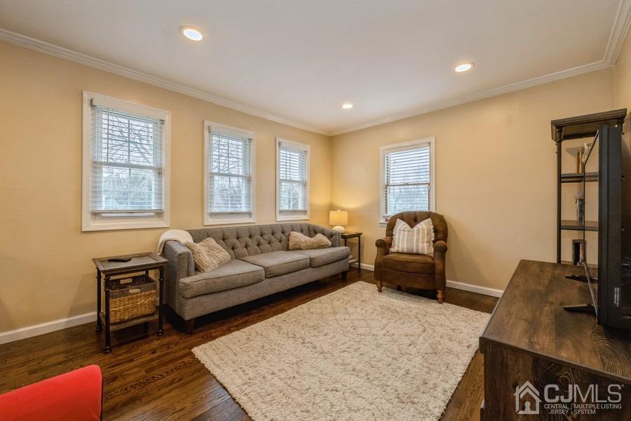 35 Pine Tree Drive Colonia, NJ 07067 - Photo 11 of 39 a living room with furniture and a window