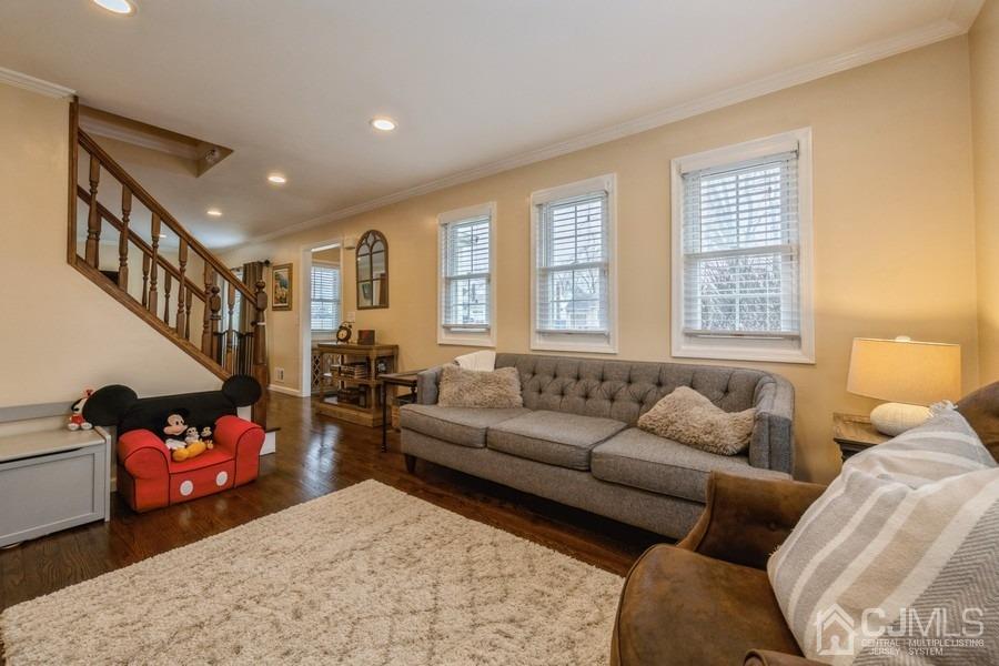 35 Pine Tree Drive Colonia, NJ 07067 - Photo 12 of 39 a living room with furniture fireplace and a window