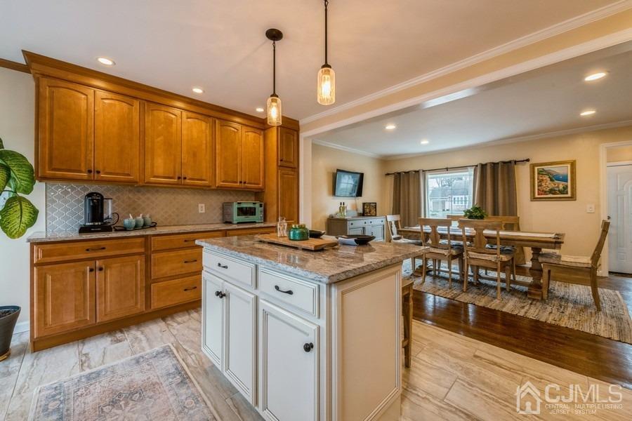 35 Pine Tree Drive Colonia, NJ 07067 - Photo 14 of 39 a kitchen with lots of counter top space and appliances