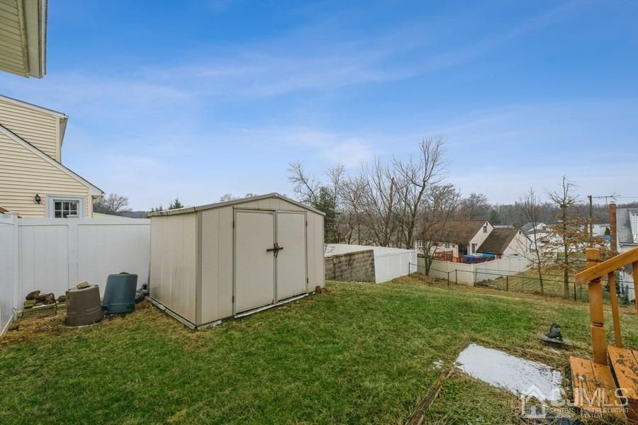 35 Pine Tree Drive Colonia, NJ 07067 - Photo 32 of 39 a view of a backyard with sitting area