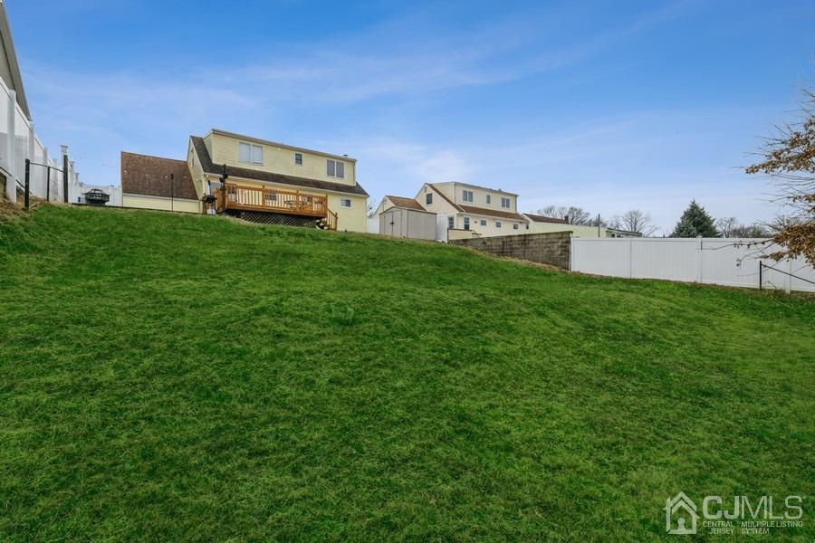 35 Pine Tree Drive Colonia, NJ 07067 - Photo 34 of 39 a view of a backyard with sitting area