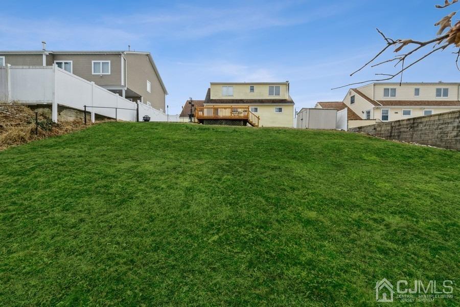 35 Pine Tree Drive Colonia, NJ 07067 - Photo 35 of 39 a front view of a house with a yard