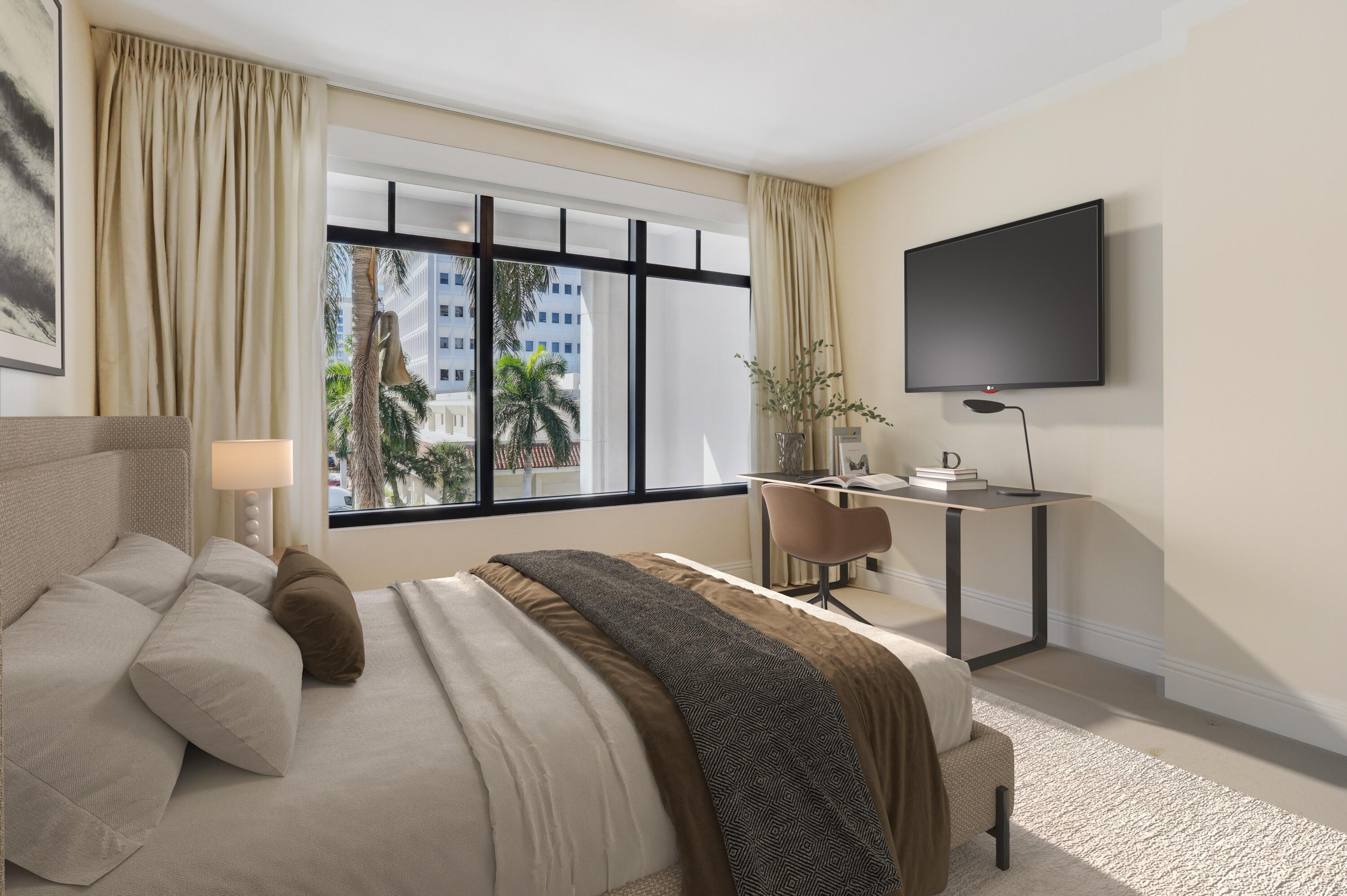 200 East Palmetto Park Road, Unit 10 Boca Raton, FL 33432 - Photo 20 of 47 a bedroom with a large bed and a flat screen tv