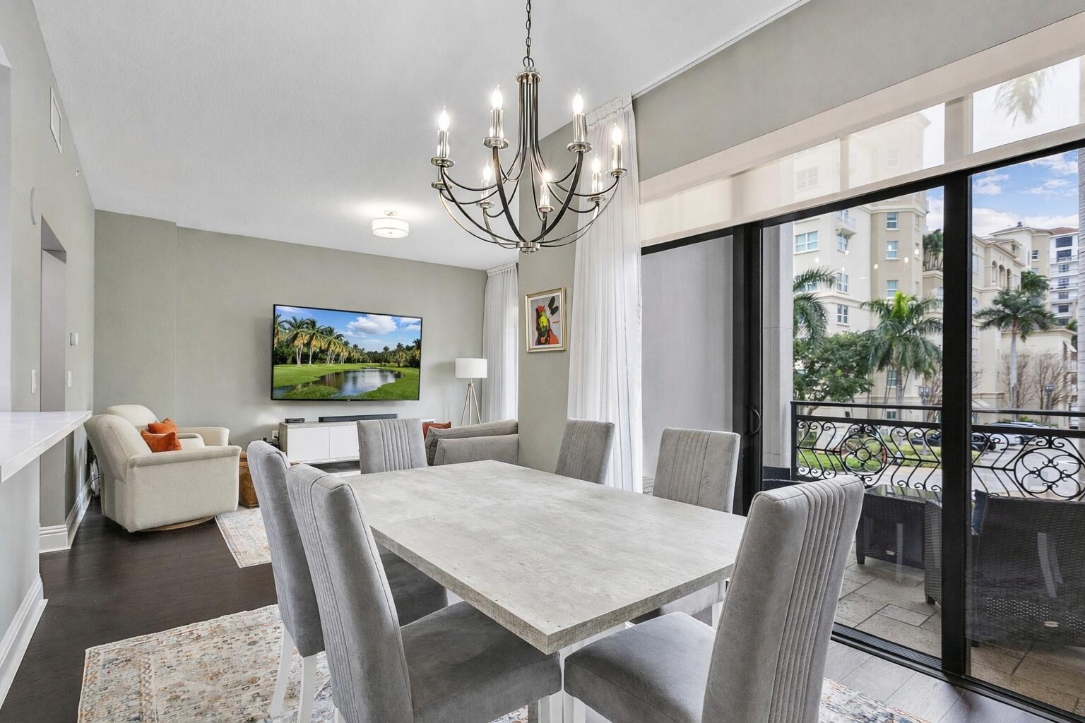 200 East Palmetto Park Road, Unit 10 Boca Raton, FL 33432 - Photo 3 of 47 a view of a dining room with furniture window and outside view