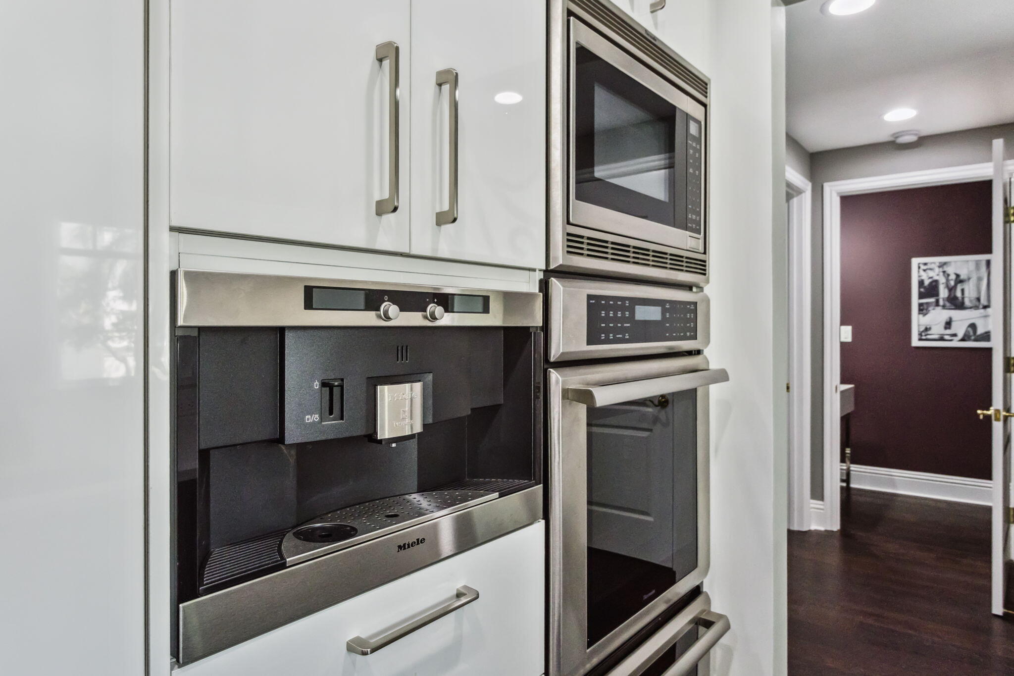 200 East Palmetto Park Road, Unit 10 Boca Raton, FL 33432 - Photo 6 of 47 a kitchen with a sink stainless steel appliances and cabinets