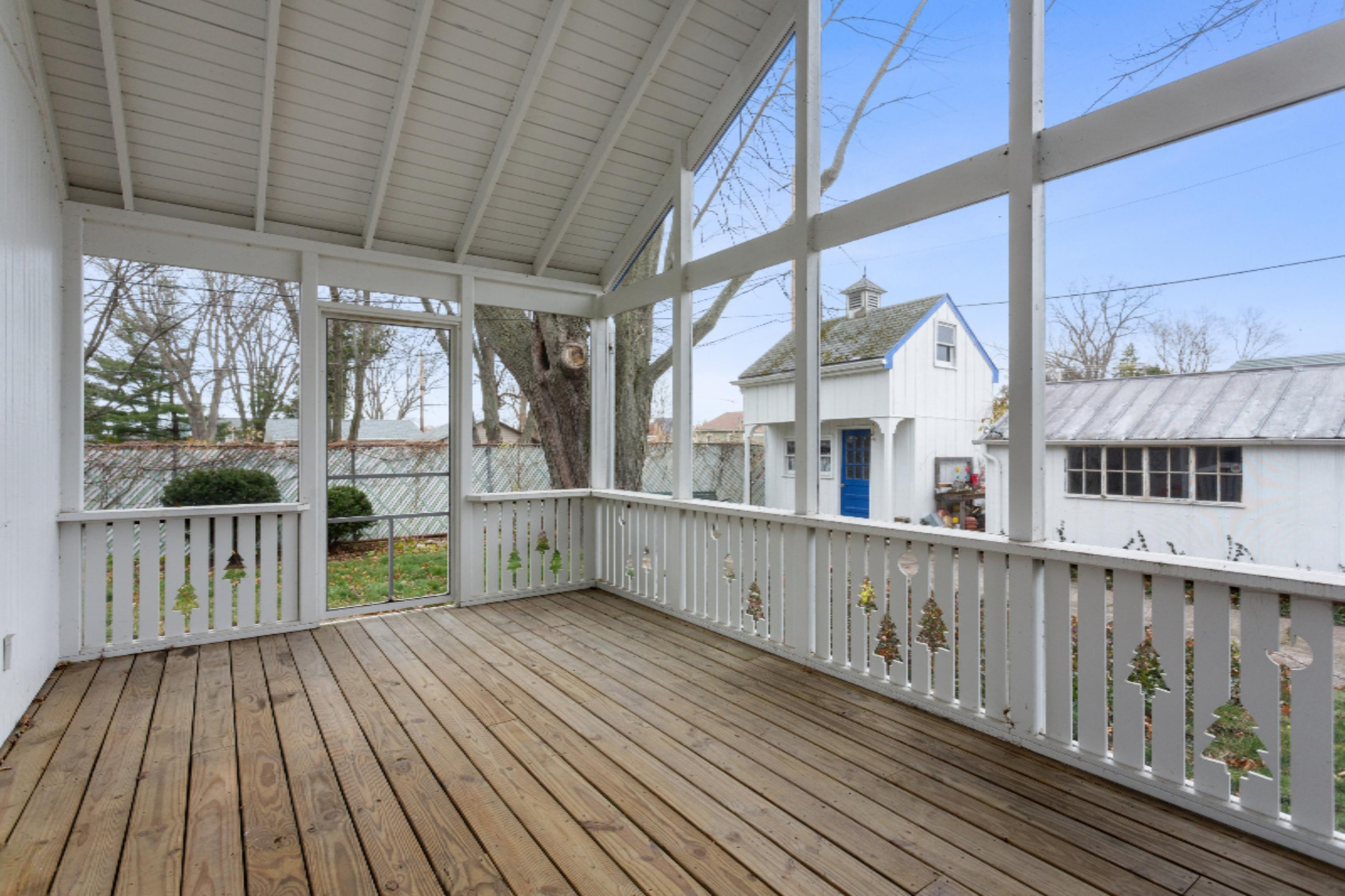 103 North Berrien Street New Buffalo, MI 49117 - Photo 4 of 22 View of screened porch