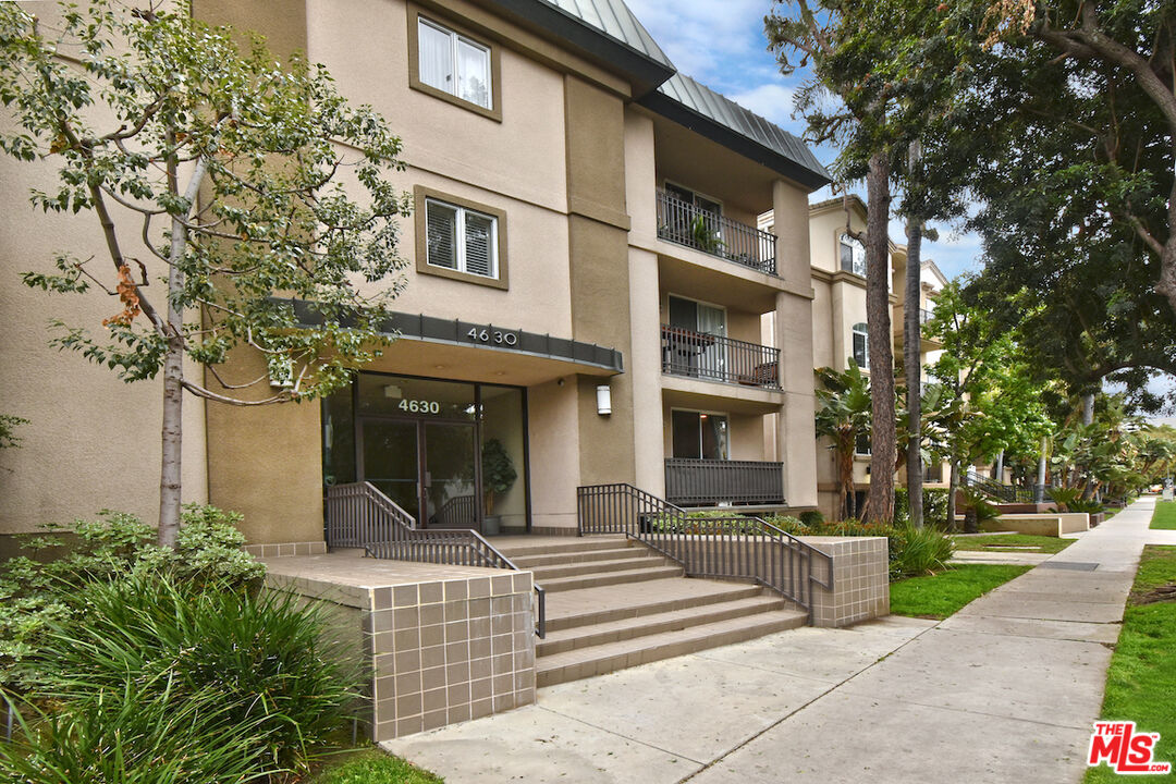 a view of a building with a porch