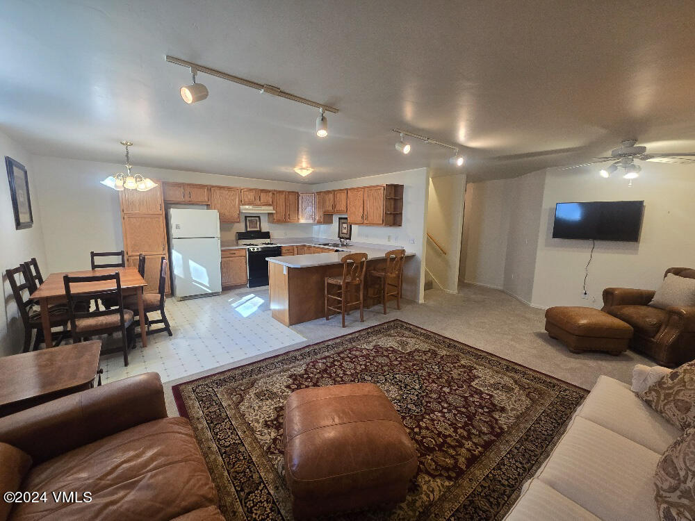 702 Bull Run Eagle, CO 81631 - Photo 19 of 26 a living room with furniture and a rug