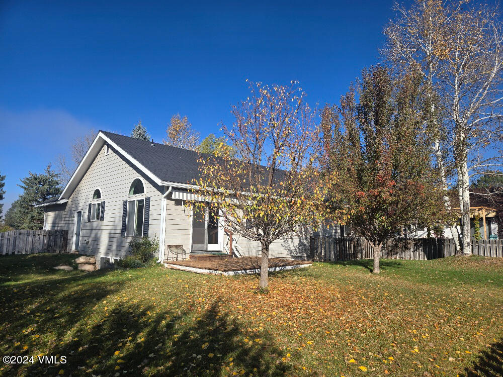 702 Bull Run Eagle, CO 81631 - Photo 2 of 26 a front view of a house with a yard