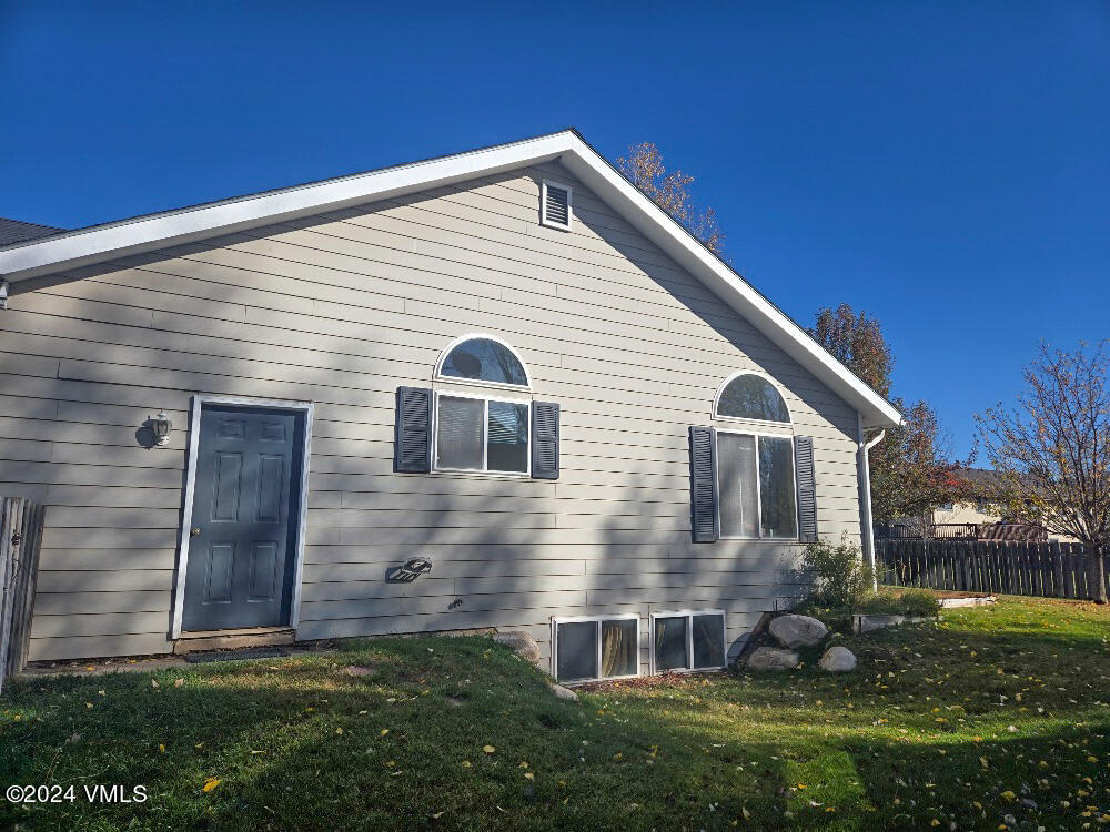 702 Bull Run Eagle, CO 81631 - Photo 3 of 26 a view of house with backyard