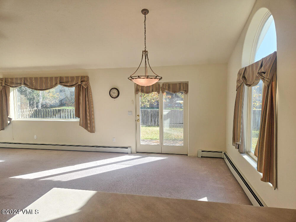 702 Bull Run Eagle, CO 81631 - Photo 10 of 26 a view of a room with window wooden floor and cabinet