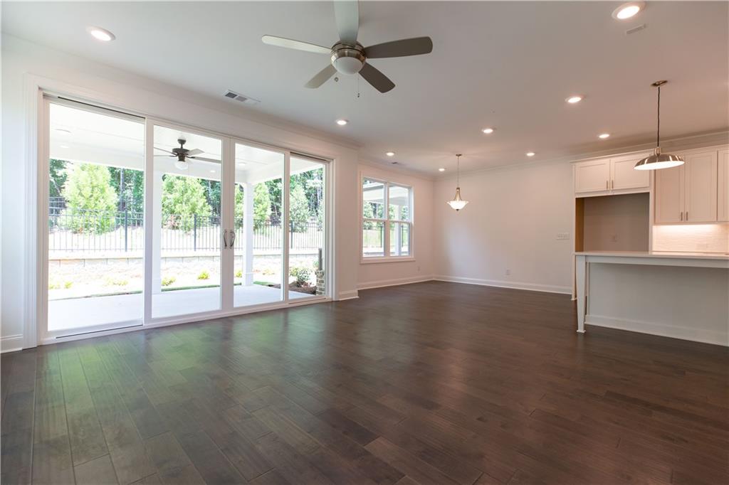 Beautiful Stockton plan with this amazing 12ft sliding door leading onto your covered patio and fenced backyard!! You Could Enjoy this everyday! **Pic not of actual home but of previously built home