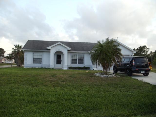 164 Southwest Sea Lion Road Port St. Lucie, FL 34953 - Photo 1 of 12 Primary Photo