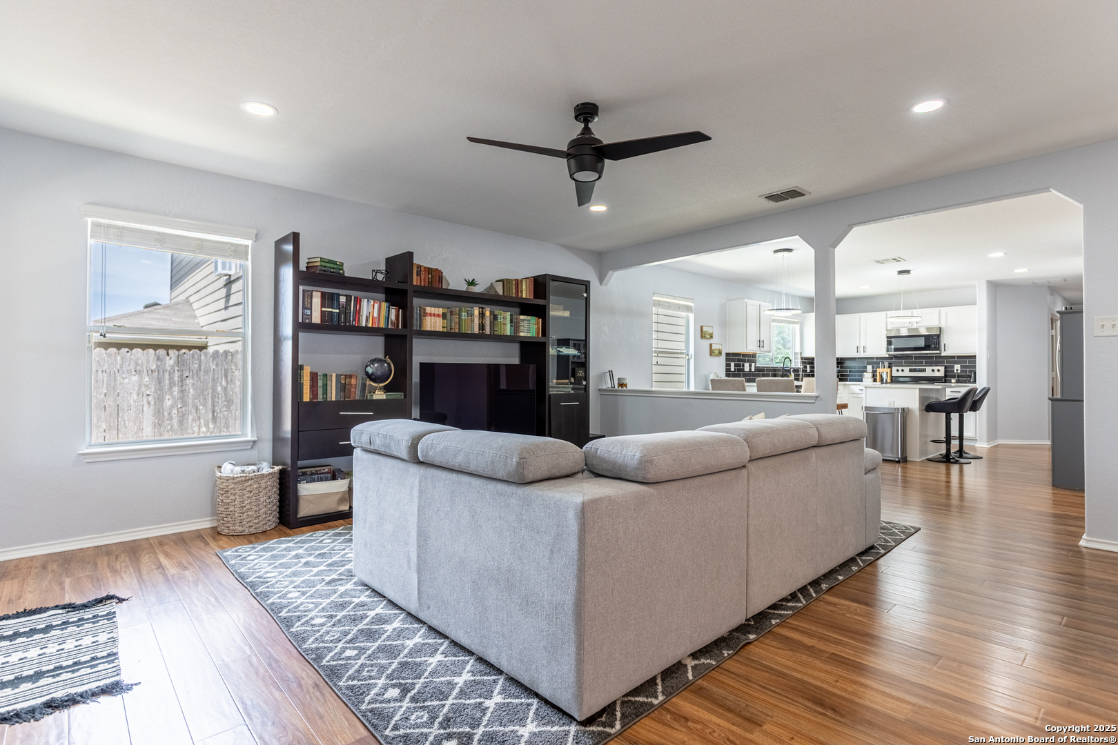 9518 Lookover Bay Converse, TX 78109 - Photo 11 of 30 a living room with furniture and a window