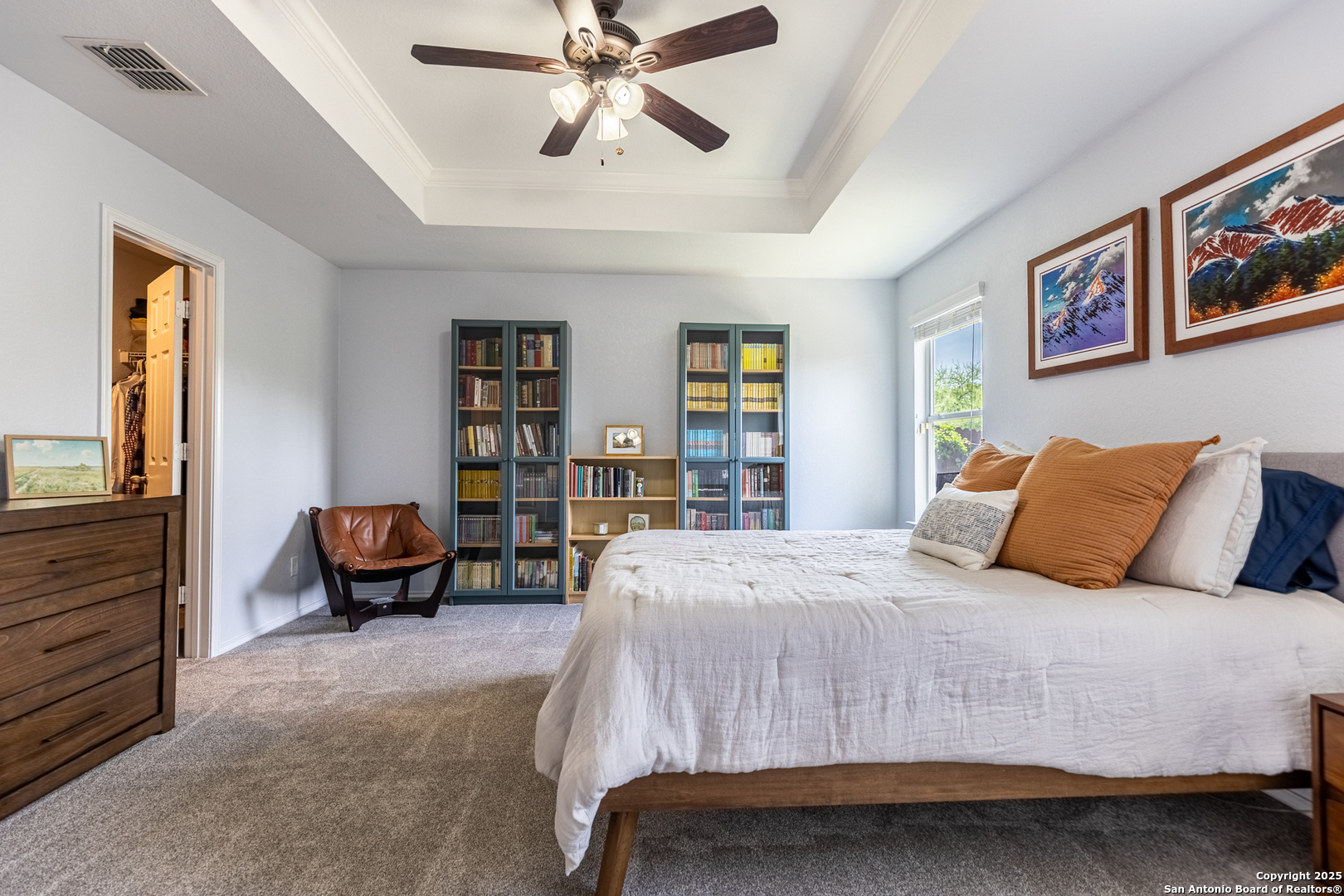 9518 Lookover Bay Converse, TX 78109 - Photo 17 of 30 a bedroom with a bed couch and window