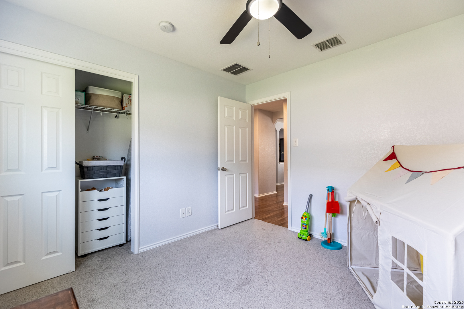 9518 Lookover Bay Converse, TX 78109 - Photo 26 of 30 a view of an empty room with cabinet and a window