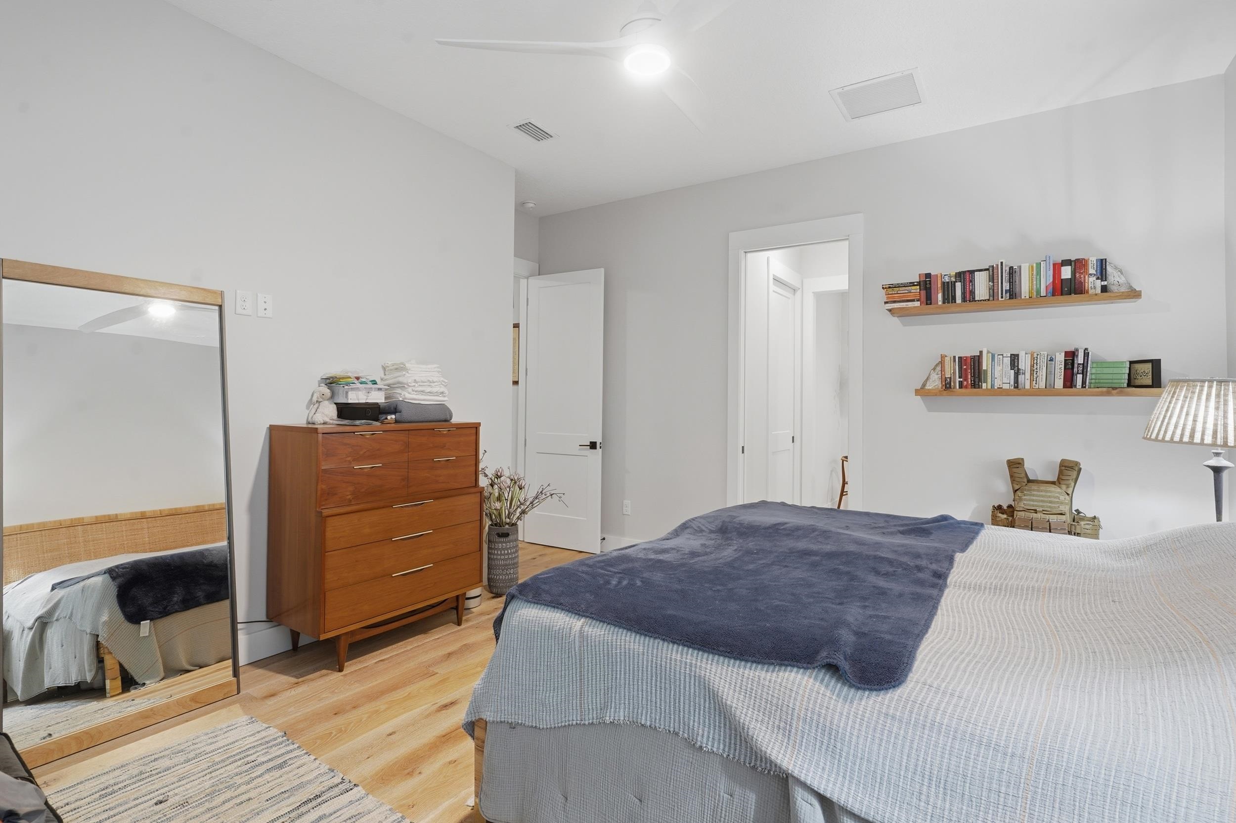240 Ridgeway Road St. Augustine, FL 32080 - Photo 28 of 38 Bedroom with light wood-type flooring and ceiling fan