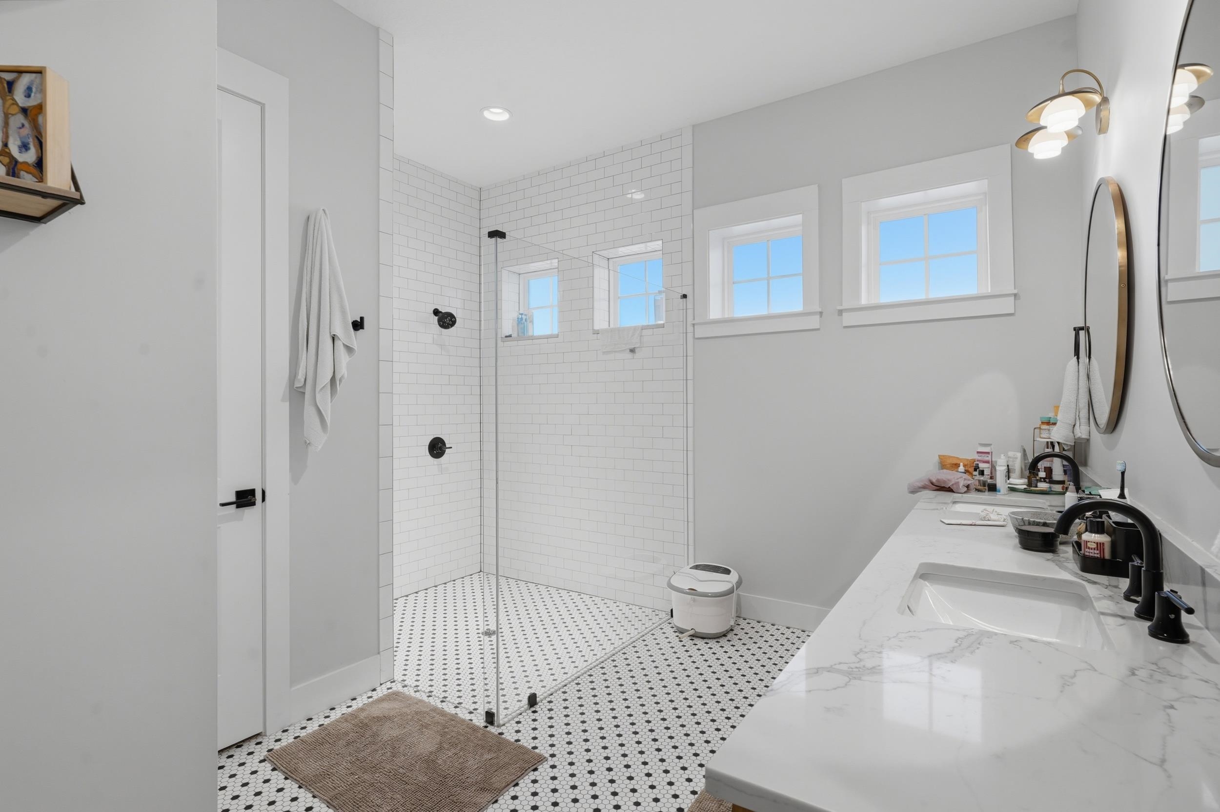 240 Ridgeway Road St. Augustine, FL 32080 - Photo 29 of 38 Bathroom with double vanity, a walk in shower, and recessed lighting