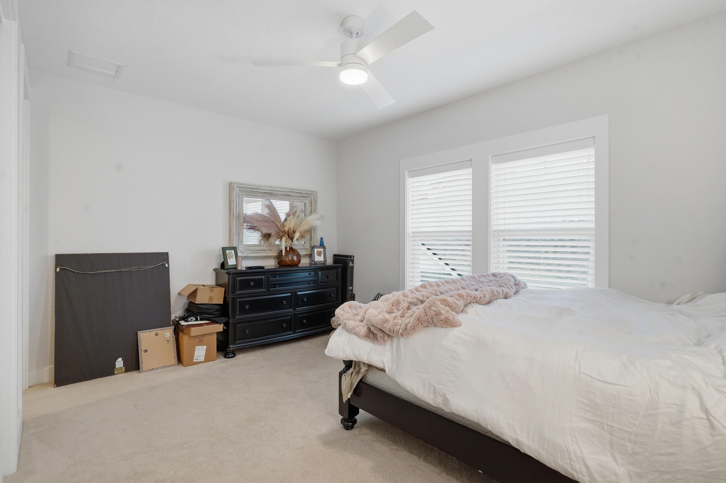 240 Ridgeway Road St. Augustine, FL 32080 - Photo 10 of 38 Bedroom featuring light colored carpet and ceiling fan