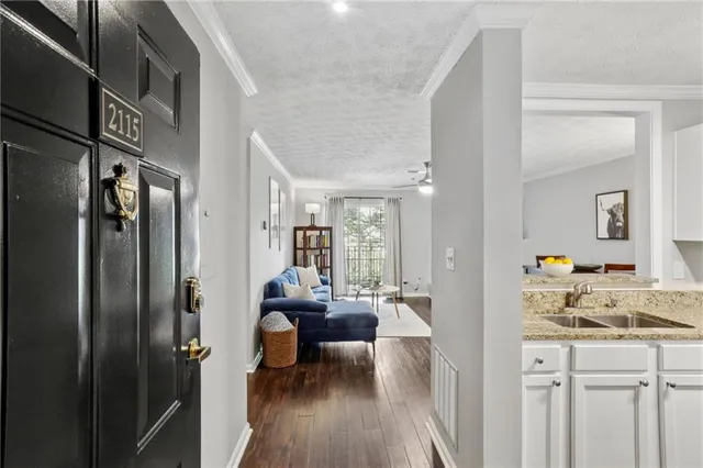 a view of a bathroom with dual sinks