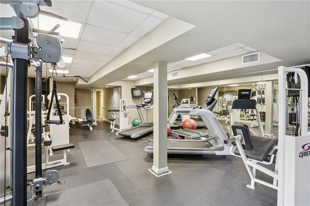 970 Sidney Marcus Boulevard Northeast, Unit 2115 Atlanta, GA 30324 - Photo 20 of 21 a view of a room with gym equipment