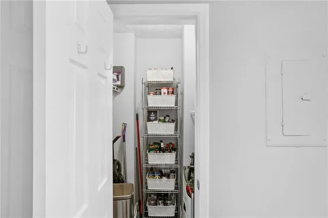 a picture of a room with table and closet