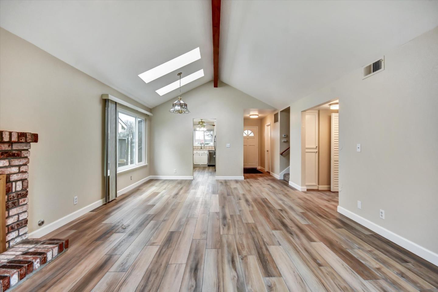 420 Brighton Street Salinas, CA 93907 - Photo 11 of 41 a view of a room with wooden floor and window