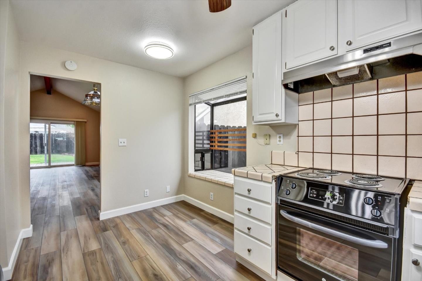 420 Brighton Street Salinas, CA 93907 - Photo 15 of 41 a kitchen with a stove and a microwave