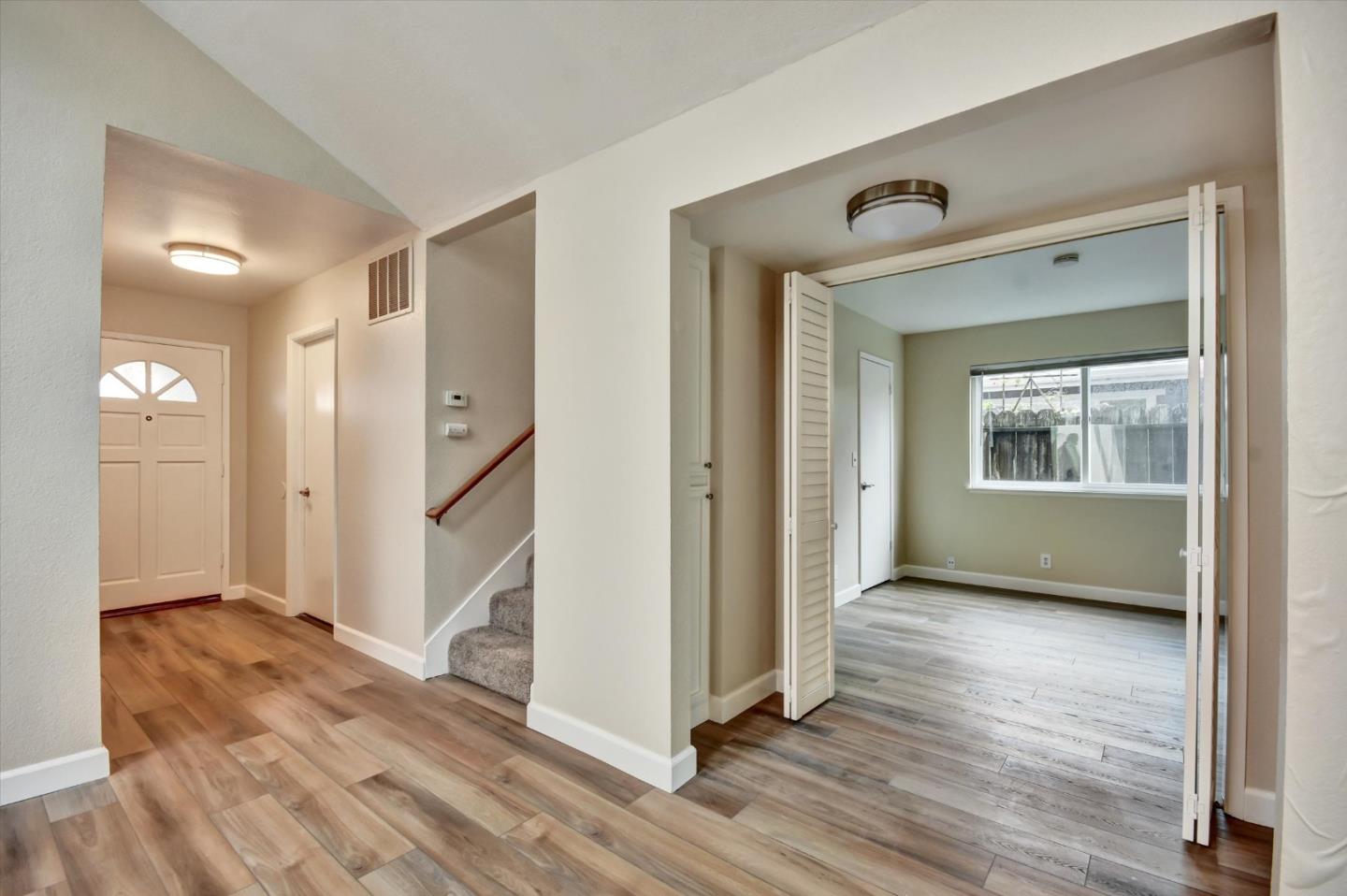 420 Brighton Street Salinas, CA 93907 - Photo 16 of 41 a view of an empty room with wooden floor and a window