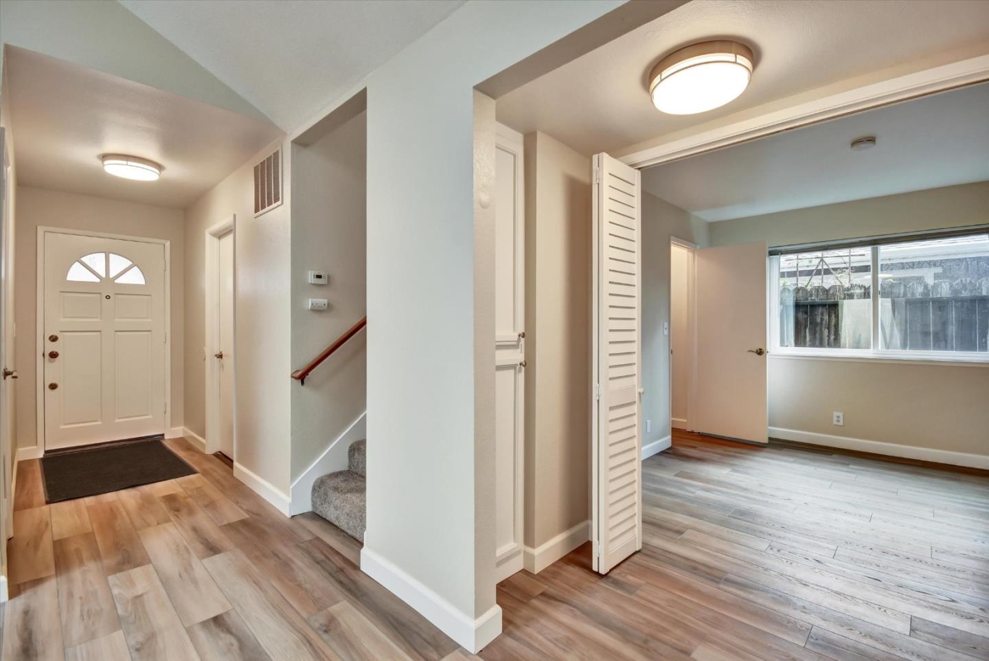 420 Brighton Street Salinas, CA 93907 - Photo 17 of 41 a view of an empty room with wooden floor and a window