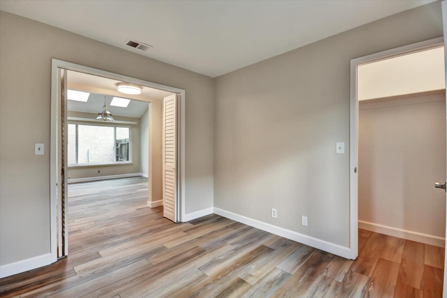 420 Brighton Street Salinas, CA 93907 - Photo 19 of 41 wooden floor in an empty room with a window
