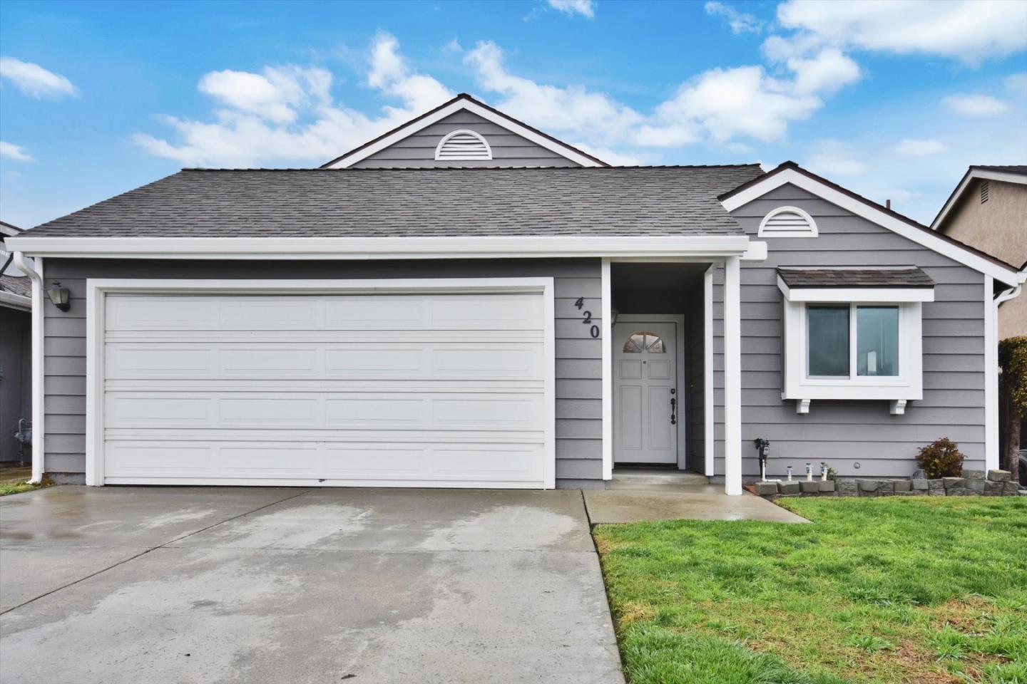 420 Brighton Street Salinas, CA 93907 - Photo 2 of 41 a front view of a house with a yard