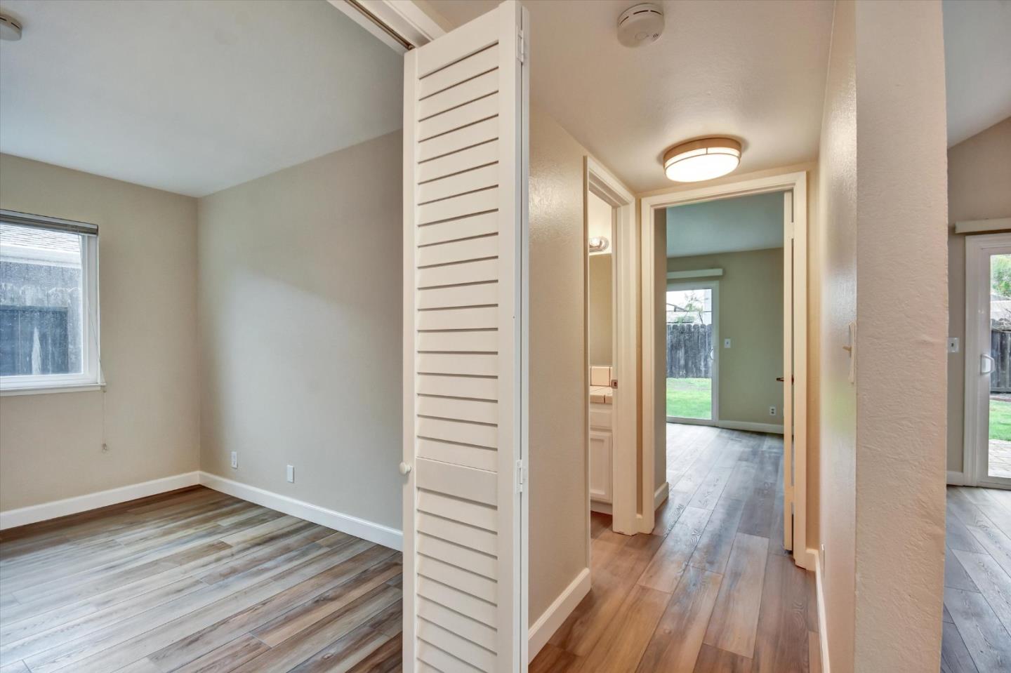 420 Brighton Street Salinas, CA 93907 - Photo 21 of 41 a view of a hallway with wooden floor