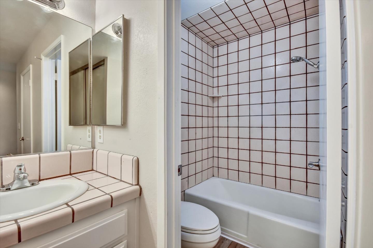 420 Brighton Street Salinas, CA 93907 - Photo 34 of 41 a bathroom with a bathtub and shower