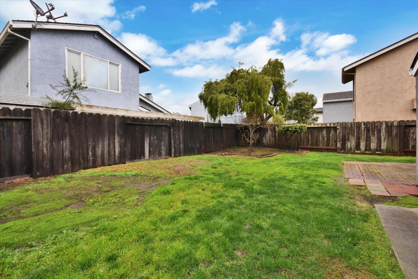 420 Brighton Street Salinas, CA 93907 - Photo 38 of 41 a backyard of a house with lots of green space