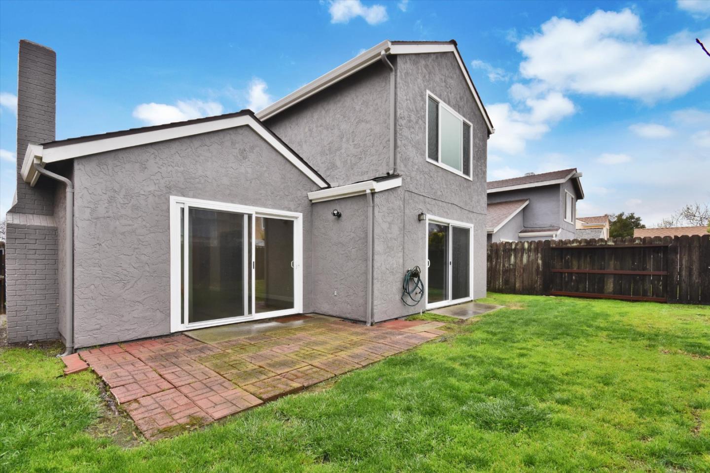 420 Brighton Street Salinas, CA 93907 - Photo 40 of 41 a view of a house with a yard and pathway