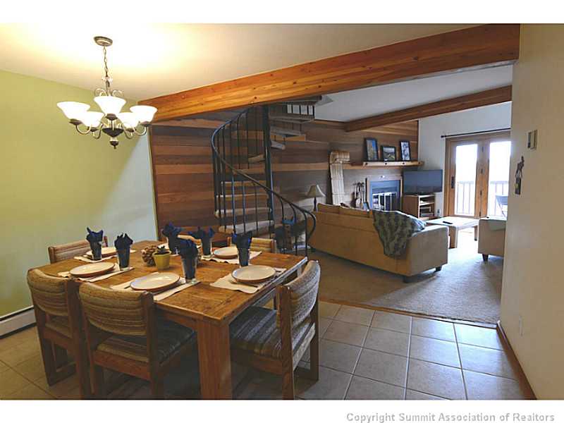 9460 Ryan Gulch Road, Unit 82 Silverthorne, CO 80498 - Photo 2 of 25 Dining Room. Spacious dining room opens to living room.