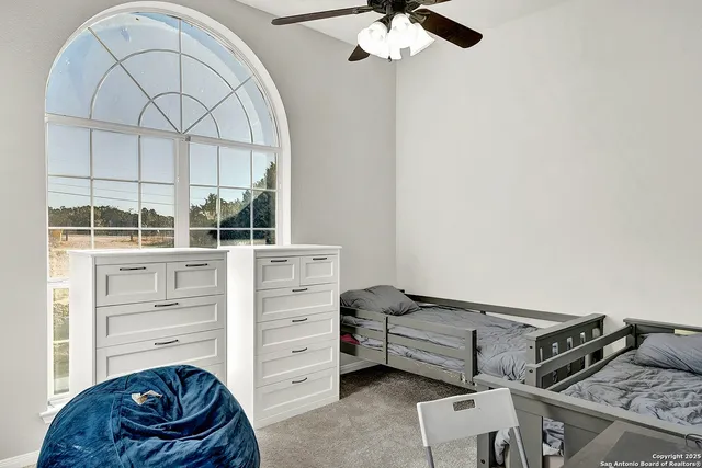 a bathroom with a sink a vanity and a mirror